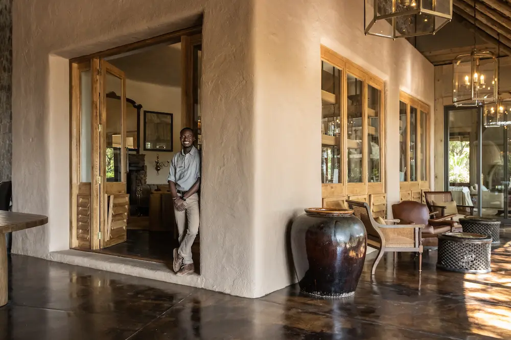Singita Ebony Lodge_Entrance to Conservation Room_Smiling Staff Member_Emma Jackson