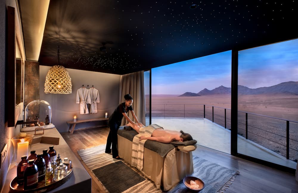Sossusvlei-Desert-Lodge-General-Guest-Area-Spa-massage-room-with-a-view-with-guest-High-Resolution-Width=5000px